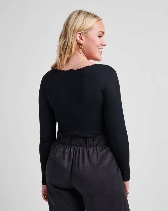 Women All Tops TravisMathew SOMETHING SWEET CLOUD RIBBED TOP Black