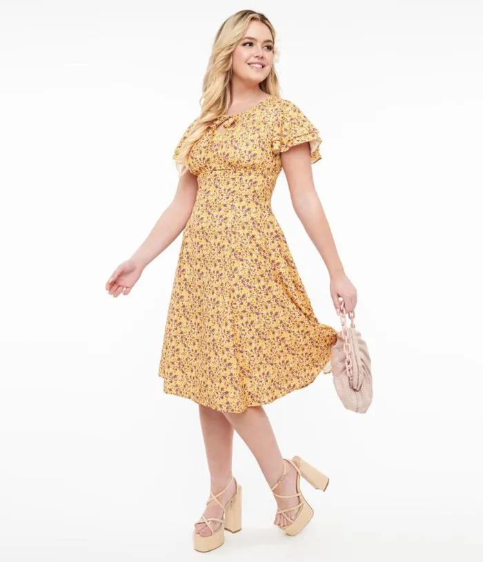 1950s Yellow and Purple Floral Capelet Swing Dress Dresses Unique Vintage Swing 1950s Yellow and Purple Floral Capelet Swing Dress Dresses Unique Vintage Swing