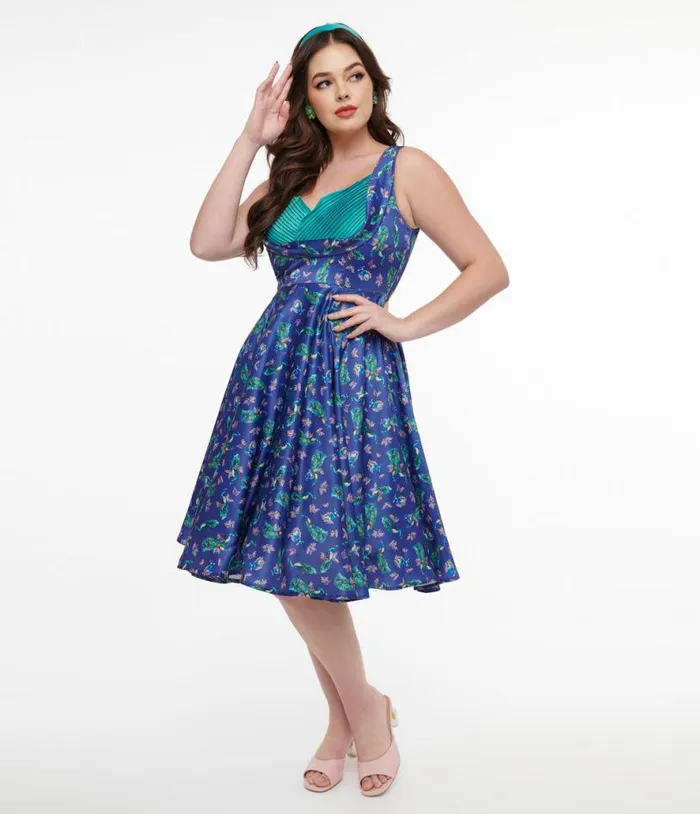 Dolly and Dotty 1950s Purple and Teal Peacock Print Grace Swing Dress DressesPlus Unique Vintage Swing