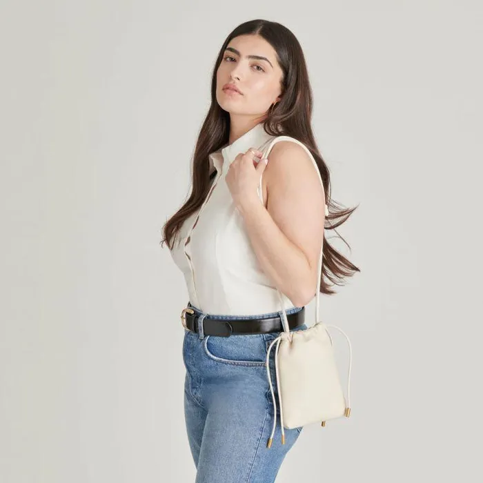 Handbags Shop Dolce Vita Evie Crossbody Pouch Ivory Pebble Leather Leather Crossbody Pouch Ivory Pebble Leather
