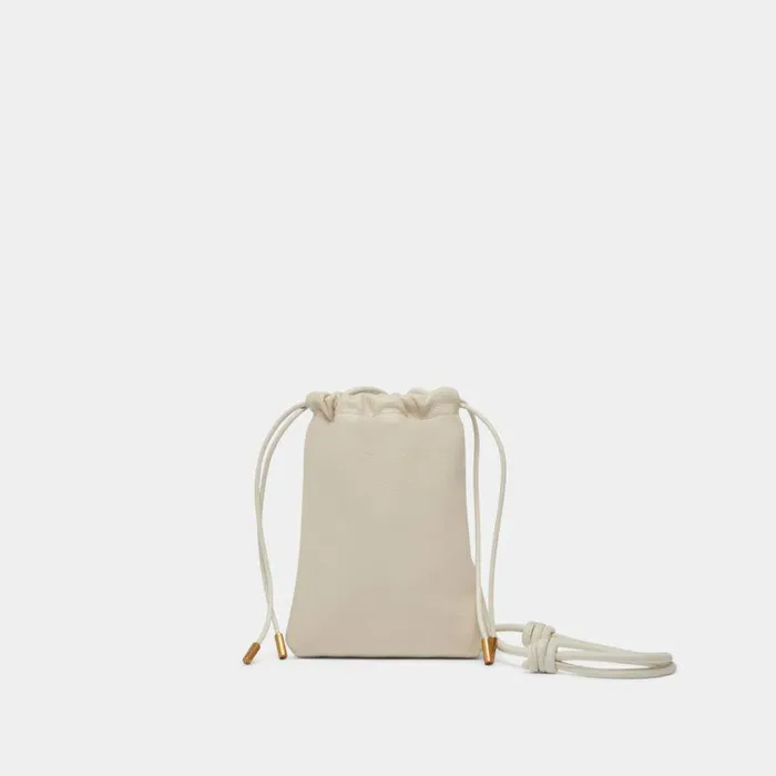 Handbags Shop Dolce Vita Evie Crossbody Pouch Ivory Pebble Leather Leather Crossbody Pouch Ivory Pebble Leather
