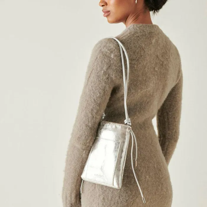 Handbags Shop Dolce Vita Evie Crossbody Pouch Silver Distressed Leather Women039s Crossbody Pouch Silver Distressed Leather
