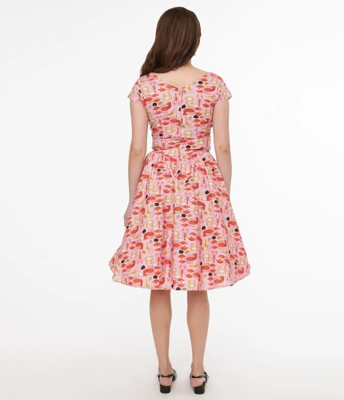 Retrolicious 1950s Pink and Red Lobster Print Cotton Greta Swing Dress Dresses Unique Vintage Pocket Dresses