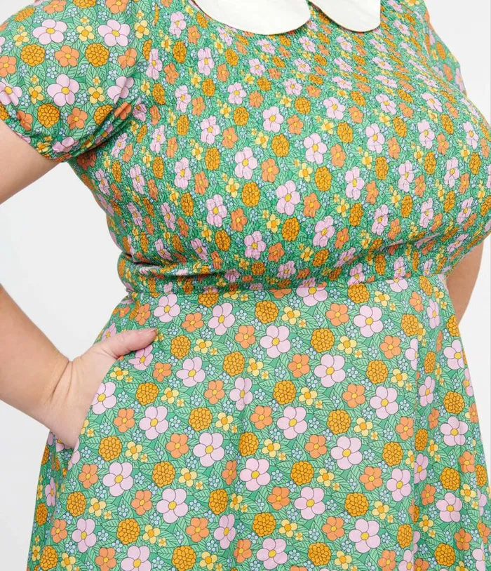 Smak Parlour Plus Size 1960s Green Floral Smocked Fit and Flare Dress DressesPlus Unique Vintage Pocket Dresses